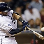  San Diego Padres' Rene Rivera breaks his bat as he fouls off a pitch while batting against the Arizona Diamondbacks during the sixth inning of a baseball game Tuesday, Sept. 2, 2014, in San Diego. (AP Photo/Gregory Bull)