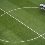 Players from the Netherlands, left, and Argentina, right, observe a minute of silence to honor the death of Argentine soccer legend Alfredo di Stefano prior to their World Cup semifinal soccer match at the Itaquerao Stadium in Sao Paulo, Brazil, Wednesday, July 9, 2014. (AP Photo/Francois Xavier Marit, Pool)