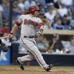 Arizona Diamondbacks' Miguel Montero hits an RBI-single while playing the San Diego Padres during the third inning of a baseball game Thursday, Sept. 4, 2014, in San Diego. (AP Photo/Gregory Bull)