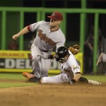 Miami Marlins runner Ichiro Suzuki, right, is thrown out in the 13th inning on a throw to Arizona Diamondbacks' Chris Owings, right, during a baseball game in Miami, Monday, May 18, 2015. The Diamondbacks won 3-2 in the 13th inning. (AP Photo/J Pat Carter)