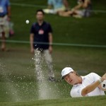 Ernie Els, of South Africa, hits out of a bunker on the sixth hole during the fourth round of the Masters golf tournament Sunday, April 12, 2015, in Augusta, Ga. (AP Photo/Matt Slocum)