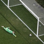 Croatia's goalkeeper Stipe Pletikosa can't stop a goal by Brazil's Neymar during the group A World Cup soccer match between Brazil and Croatia, the opening game of the tournament, in the Itaquerao Stadium in Sao Paulo, Brazil, Thursday, June 12, 2014. (AP Photo/Fabrizio Bensch, Pool)