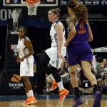 Minnesota Lynx's Lindsay Whalen, center, reacts after making a basket and closing the gap with the Phoenix Mercury during the first half of Game 2 of the WNBA basketball Western Conference finals on Sunday, Aug. 31, 2014, in Minneapolis. The Lynx won 82-77. (AP Photo/The Star Tribune, Kyndell Harkness)