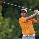 Rickie Fowler watches his tee shot on the fourth hole during the final round of the PGA Championship golf tournament at Valhalla Golf Club on Sunday, Aug. 10, 2014, in Louisville, Ky. (AP Photo/Jeff Roberson)