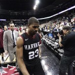  Harvard's Wesley Saunders (23) walks off the court after the third-round game of the NCAA men's college basketball tournament against Michigan State in Spokane, Wash., Saturday, March 22, 2014. Michigan State won 80-73. (AP Photo/Young Kwak)