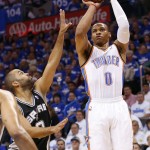  Oklahoma City Thunder guard Russell Westbrook (0) shoots over San Antonio Spurs guard Tony Parker (9) in the first quarter of Game 4 of the Western Conference finals NBA basketball playoff series in Oklahoma City, Tuesday, May 27, 2014. (AP Photo/Sue Ogrocki)
