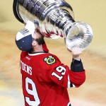 Chicago Blackhawks' Jonathan Toews kisses the Stanley Cup trophy after defeating the Tampa Bay Lightning in Game 6 of the NHL hockey Stanley Cup Final series on Wednesday, June 10, 2015, in Chicago. The Blackhawks defeated the Lightning 2-0 to win the series 4-2. (AP Photo/Charles Rex Arbogast)
