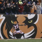 Cincinnati Bengals' Dre Kirkpatrick celebrates following a 30-yard interception return for a touchdown during the second half of an NFL football game against the Denver Broncos on Monday, Dec. 22, 2014, in Cincinnati. (AP Photo/AJ Mast)