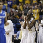 Wichita State cheers against Kentucky during the first half of a third-round game of the NCAA college basketball tournament Sunday, March 23, 2014, in St. Louis. (AP Photo/Charlie Riedel)