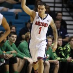 Arizona's Gabe York celebrates after making a 3-point basket against Oregon during the first half of an NCAA college basketball game in the championship of the Pac-12 conference tournament Saturday, March 14, 2015, in Las Vegas. (AP Photo/John Locher)