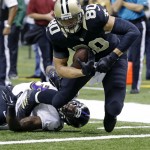 New Orleans Saints tight end Jimmy Graham (80) scores a touchdown reception in the first half of an NFL football game against the Baltimore Ravens in New Orleans, Monday, Nov. 24, 2014. (AP Photo/Jonathan Bachman)