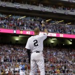 American League shortstop Derek Jeter, of the New York Yankees, waves as he is taken out of the game in the top of the fourth inning of the MLB All-Star baseball game, Tuesday, July 15, 2014, in Minneapolis. (AP Photo/Jeff Roberson)