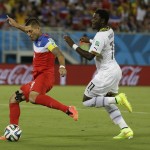 United States' Clint Dempsey shoots and scores the opening goal during the group G World Cup soccer match between Ghana and the United States at the Arena das Dunas in Natal, Brazil, Monday, June 16, 2014. (AP Photo/Ricardo Mazalan)