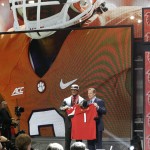 Clemson defensive lineman Vic Beasley poses for photos with NFL commissioner Roger Goodell after being selected by the Atlanta Falcons as the eighth pick in the first round of the 2015 NFL Draft, Thursday, April 30, 2015, in Chicago. (AP Photo/Nam Y. Huh)