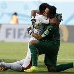  Costa Rica's goalkeeper Keylor Navas hugs a teammate following the team's 1-0 victory over Italy during the group D World Cup soccer match between Italy and Costa Rica at the Arena Pernambuco in Recife, Brazil, Friday, June 20, 2014. (AP Photo/Ricardo Mazalan)