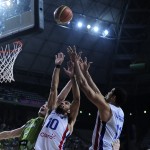 Dominican Republic's James Ferldeine, center, and Eloy Vargas, second right, vies for the ball against Slovenia's Zoran Dragic, left, during Basketball World Cup Round of 16 match between Dominican Republic and Slovenia at the Palau Sant Jordi in Barcelona, Spain, Saturday, Sept. 6, 2014. The 2014 Basketball World Cup competition will take place in various cities in Spain from Aug. 30 through to Sept. 14. (AP Photo/Manu Fernandez)