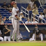 Arizona Diamondbacks' Aaron Hill (2) jumps up and down after batting during the sixth inning of a baseball game in Miami, Thursday, May 21, 2015. Hill hit a sacrifice fly to center field scoring teammate Chris Owings. The Diamondbacks won 7-6, sweeping the series. (AP Photo/J Pat Carter)