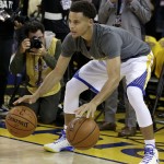 Golden State Warriors guard Stephen Curry warms up before Game 5 of basketball's NBA Finals against the Cleveland Cavaliers in Oakland, Calif., Sunday, June 14, 2015. (AP Photo/Ben Margot)
