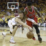 Cleveland Cavaliers forward LeBron James (23) drives against Chicago Bulls guard Jimmy Butler during the second half of Game 1 in a second-round NBA basketball playoff series Monday, May 4, 2015, in Cleveland. (AP Photo/Tony Dejak)