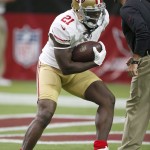 San Francisco 49ers' Frank Gore warms up prior to an NFL football game against the Arizona Cardinals, Sunday, Sept. 21, 2014, in Glendale, Ariz. (AP Photo/Ross D. Franklin)