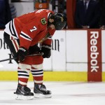 Chicago Blackhawks' Brent Seabrook pauses as he warms up before the start of Game 6 in the NHL hockey Stanley Cup Final series against the Tampa Bay Lightning on Monday, June 15, 2015, in Chicago. (AP Photo/Nam Y. Huh)