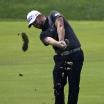 Ryan Moore hits from the fairway on the fourth hole during the final round of the PGA Championship golf tournament at Valhalla Golf Club on Sunday, Aug. 10, 2014, in Louisville, Ky. (AP Photo/David J. Phillip)