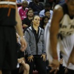 Becky Hammon coaches the San Antonio Spurs against the Phoenix Suns during the first half of an NBA summer league basketball game Monday, July 20, 2015, in Las Vegas. (AP Photo/John Locher)
