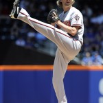 Arizona Diamondbacks starter Bronson Arroyo (61) pitches against the New York Mets in the first inning in game one of a double header baseball game at Citi Field on Sunday, May 25, 2014, in New York. (AP Photo/Kathy Kmonicek)