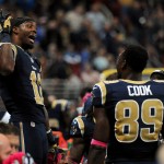 St. Louis Rams wide receiver Tavon Austin, left, celebrates in the bench area with teammate tight end Jared Cook during the second quarter of an NFL football game against the Seattle Seahawks, Sunday, Oct. 19, 2014, in St. Louis. (AP Photo/L.G. Patterson)