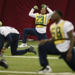 Seattle Seahawks' Jeron Johnson (23) stretches during a team practice for NFL Super Bowl XLIX football game, Friday, Jan. 30, 2015, in Tempe, Ariz. The Seahawks play the New England Patriots in Super Bowl XLIX on Sunday, Feb. 1, 2015. (AP Photo/Matt York)