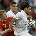 United States' Jermaine Jones, right, holds off Belgium's Kevin De Bruyne during the World Cup round of 16 soccer match between Belgium and the USA at the Arena Fonte Nova in Salvador, Brazil, Tuesday, July 1, 2014. (AP Photo/Matt Dunham)