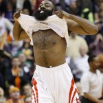 Houston Rockets' James Harden celebrates his game-winning shot against the Phoenix Suns in an NBA basketball game Friday, Jan. 23, 2015, in Phoenix. The Rockets defeated the Suns 113-111. (AP Photo/Ross D. Franklin)
