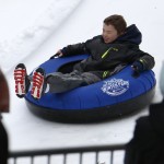 A young visitor to the NHL All-Star Winter Park, takes advantage of a tubing run setup outside Nationwide Arena, Saturday, Jan. 24, 2015 in Columbus, Ohio. The NHL All-Star hockey game will be played Sunday at the arena. (AP Photo/Gene J. Puskar)