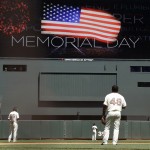  The San Francisco Giants observe a moment of silence in honor of Memorial Day during a baseball game against the Chicago Cubs on Monday, May 26, 2014, in San Francisco. (AP Photo/Marcio Jose Sanchez)