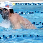 Michael Phelps practices, Wednesday, April 23, 2014, in Mesa, Ariz. Phelps is competing in the Arena Grand Prix at Mesa on Thursday in an attempt to return to swimming professionally. (AP Photo/Matt York)