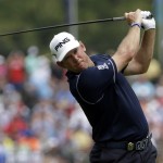 Lee Westwood, of England, watches his tee shot on the fifth hole during the third round of the PGA Championship golf tournament at Valhalla Golf Club on Saturday, Aug. 9, 2014, in Louisville, Ky. (AP Photo/David J. Phillip)