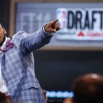 NBA draft prospect Adreian Payne of Michigan State, points to fans before the start of the 2014 NBA draft, Thursday, June 26, 2014, in New York. (AP Photo/Jason DeCrow)