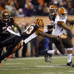  Cleveland Browns wide receiver Miles Austin (19) runs past Cincinnati Bengals strong safety George Iloka (43) during the second half of an NFL football game Thursday, Nov. 6, 2014, in Cincinnati. (AP Photo/AJ Mast)