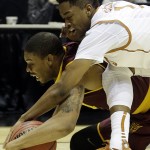  Arizona State guard Jermaine Marshall and Texas guard Isaiah Taylor battle for a loose ball during the first half of a second round NCAA college basketball tournament game Thursday, March 20, 2014, in Milwaukee. (AP Photo/Morry Gash)