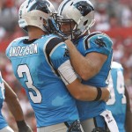 
Carolina Panthers quarterback Derek Anderson (3) celebrates with tight end Greg Olsen after Olsen caught a 5-yard touchdown pass from him during the second quarter of an NFL football game against the Tampa Bay Buccaneers, Sunday, Sept. 7, 2014, in Tampa, Fla. (AP Photo/Brian Blanco)