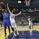  Oklahoma City Thunder center Kendrick Perkins (5) shoots against Memphis Grizzlies center Marc Gasol (33) in the first half of Game 6 of an opening-round NBA basketball playoff series Thursday, May 1, 2014, in Memphis, Tenn. (AP Photo/Mark Humphrey)