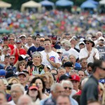  Fans applaud during the National Baseball Hall of Fame induction ceremony at the Clark Sports Center on Sunday, July 27, 2014, in Cooperstown, N.Y. (AP Photo/Mike Groll)