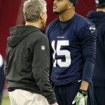 Seattle Seahawks head coach Pete Carroll talks with Jermaine Kearse (15) during a team practice for NFL Super Bowl XLIX football game, Friday, Jan. 30, 2015, in Tempe, Ariz. The Seahawks play the New England Patriots in Super Bowl XLIX on Sunday, Feb. 1, 2015. (AP Photo/Matt York)