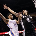 Oklahoma City Thunder guard Jeremy Lamb (11) shoots in front of San Antonio Spurs guard Danny Green (4) in the first quarter of Game 4 of the Western Conference finals NBA basketball playoff series in Oklahoma City, Tuesday, May 27, 2014. (AP Photo/Sue Ogrocki)