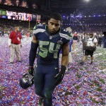Seattle Seahawks middle linebacker Bobby Wagner (54) walks off the field after the NFL Super Bowl XLIX football game against the New England Patriots Sunday, Feb. 1, 2015, in Glendale, Ariz. The Patriots won 28-24. (AP Photo/Michael Conroy)