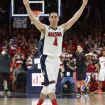 Arizona guard T.J. McConnell celebrates after defeating Stanford 91-69 during an NCAA college basketball game, Saturday, March 7, 2015, in Tucson, Ariz. (AP Photo/Rick Scuteri)