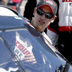 Joey Logano gets in his car before the NASCAR Xfinity Series auto race on Saturday, March 14, 2015, in Avondale, Ariz. (AP Photo/Rick Scuteri)