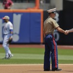  New York Mets second baseman Daniel Murphy (28) greets a Marine corporal before playing against the Pittsburgh Pirates in a baseball game, Monday, May 26, 2014, in New York. Military personnel from the U.S. Army, Navy, Air Force, Marine Corps and Coast Guard were honored before the game in recognition of Memorial Day. (AP Photo/Julie Jacobson)