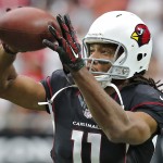 Arizona Cardinals wide receiver Larry Fitzgerald (11) warms up prior to an NFL football game against the San Francisco 49ers, Sunday, Sept. 21, 2014, in Glendale, Ariz. (AP Photo/Rick Scuteri)