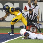 California wide receiver Stephen Anderson scores a touchdown during the first half of an NCAA college football game against Arizona, Saturday, Sept. 20, 2014, in Tucson, Ariz. (AP Photo/Rick Scuteri)
